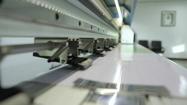 Wide digital printing on self adgesive film. Flex printing machine