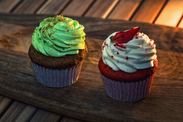 cupcakes with cream and sprinkles