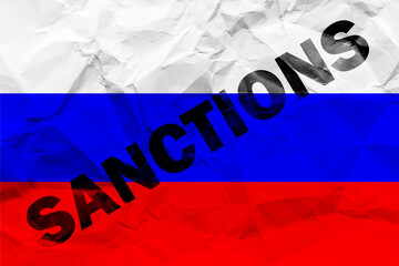 The flag of the Russia on a crumpled paper with the words 