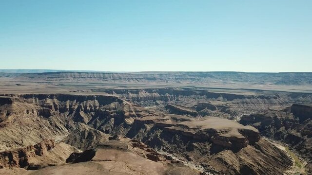 Fish River Canyon in Namibia, Africa Aerial Drone Shot.  Lanscape of the the Largest Canyon in Africa. View From Above Camera Moves Down
