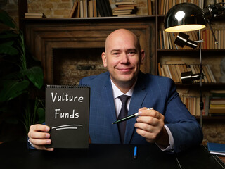 Conceptual photo about Vulture Funds with written text black notepad.
