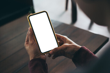 cell phone blank white screen mockup.woman hand holding texting using mobile on desk at office.background empty space for advertise.work people contact marketing business,technology