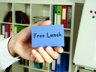 Financial concept meaning Free Lunch  with inscription on the sheet.