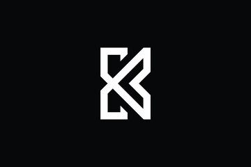 Obraz premium EK logo letter design on luxury background. KE logo monogram initials letter concept. EK icon logo design. KE elegant and Professional letter icon design on black background. E K KE EK