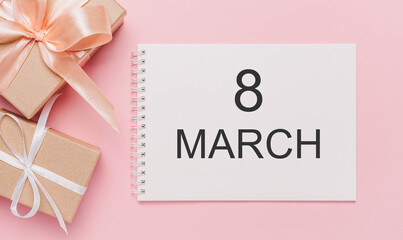Gifts with note letter on isolated pink background, love and valentine concept with text 8 march