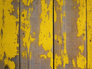 Yellow Painted wooden door weathered texture