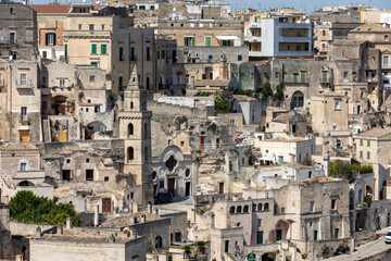 Naklejka premium View of the Sassi di Matera a historic district in the city of Matera, well-known for their ancient cave dwellings. Basilicata. Italy