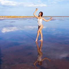 gentle dancing girl in the reflection of the clouds,