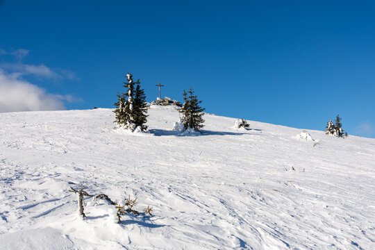 Seiner cross in Hirschegg, Austria, during winter