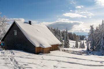 Snow-covered Knödel hut at Packalpe, Austria