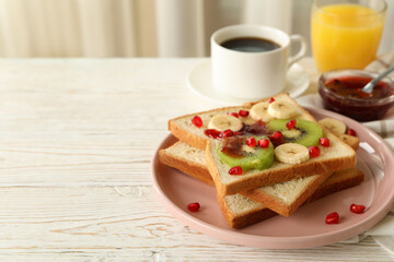 Concept of breakfast with sweet toast with fruits