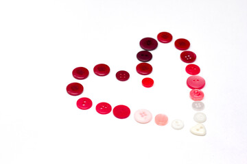 Poster Heart frame from buttons on white background. Valentines day craft. Romantic design