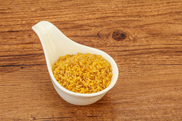 Vegetarian cuisine - dry bulgur for cooking