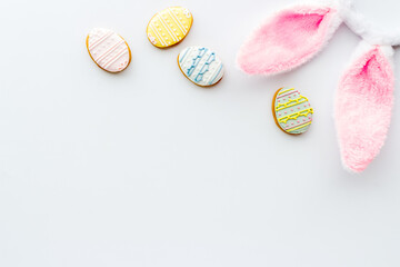 Easter bunny ears with eggs cookies, space for text
