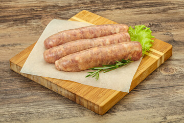 Raw pork meat sausages for grill