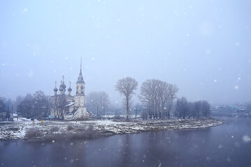 winter landscape church on the banks of the freezing river in vologda, christianity baptism russia christmas