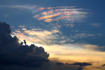 Iridescent Cloud or colorful dramatic sky with cloud at sunset of Thailand