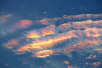 Iridescent Cloud or colorful dramatic sky with cloud at sunset of Thailand