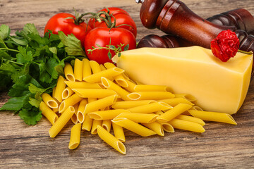Raw penne rigate for cooking
