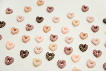 Heart shape breakfast cereals.   Hand made Natural soy wax decoration. Valentine's Day theme. True love symbolism. Creative idea. Warm greetings.