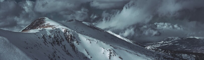 Dramatic winter storm clouds over Peak 4 at Breckenridge in the Rocky Mountains, Colorado
