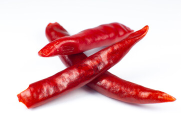 Red hot chili peppers on white background. Close up.