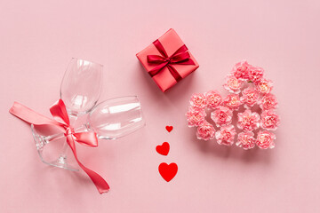 Valentines Day background with pink gift box and flowers