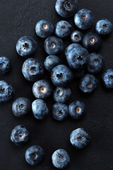 Fresh natural antioxidant blueberries pile, macro detailed close up