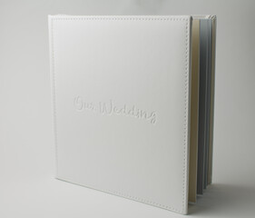 white wedding photo book from white leather on white background