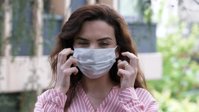 Portrait of a female engineer in a medical mask.Slow Motion 4K video.
