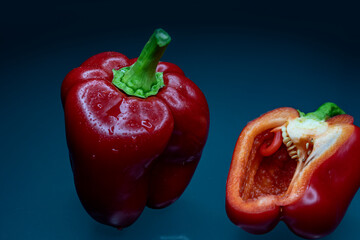 bell pepper on a dark background on a glass matte table wallpaper size 16: 9 stock photo