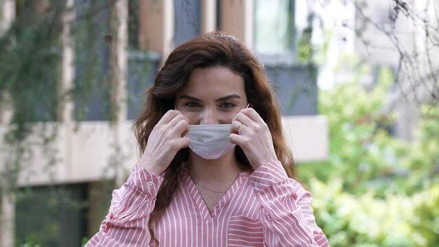Portrait of a female engineer in a medical mask.Slow Motion 4K video.