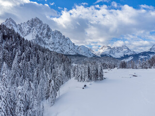 Fototapeta na wymiar Mountain in the snow. Sappada, Geometries and panoramas from above.