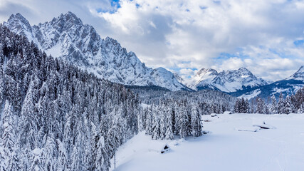 Fototapeta na wymiar Mountain in the snow. Sappada, Geometries and panoramas from above.