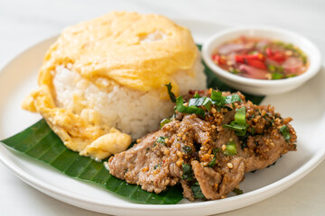 egg on topped rice with grilled pork and spicy sauce