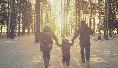 family walking in the park