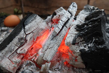 Charcoal from natural wood is burning hot.