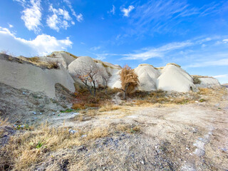 View on hills and mountains in Cappadocia, Turkey. Limestone formations. Spectacular Karst Landform