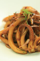 The tentacles of the squid on the grill