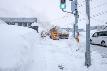 豪雪地域の道路の排雪風景