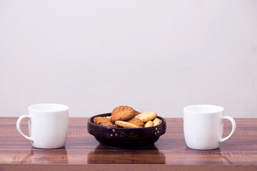 cup of coffee and cookies