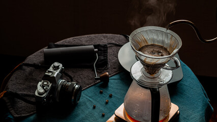 Barista making hand-drip coffee, Hand drip coffee, Barista pouring boiling water to make drip coffee, Tools for making drip coffee