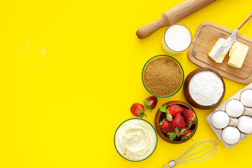 Making strawberry gift pie for valentine's day. Products for the pie are flour, sugar, butter and strawberries. .