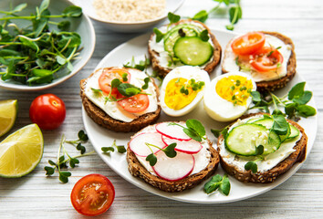 Sandwiches with healthy vegetables and micro greens