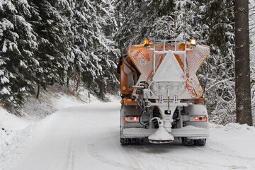 winter road spreader in Orlicke Mountains, Czech Republic