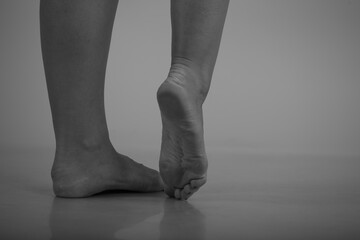 Female feet in black and white