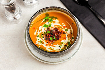 Pumpkin cream soup with bacon