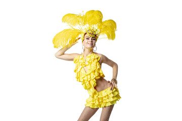 Performing. Beautiful young woman in carnival masquerade costume with yellow feathers dancing on white background. Concept of holidays celebration, festive time, dance, party, happiness. Copyspace