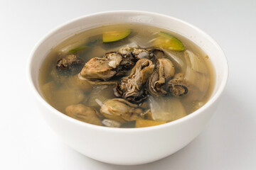 Oyster soup on white background