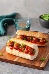 meatball sub sandwich with cheese and marinara tomato sauce. american italian fast food